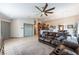 Spacious living room seamlessly connects to the kitchen and dining area creating a welcoming atmosphere at 4508 Dragon Fly Creek Ave, North Las Vegas, NV 89031