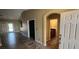 A front entryway with ceramic tile floors leads to a bathroom and an outdoor patio at 4904 Meadows Encore Ave, Las Vegas, NV 89131