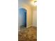 Hallway featuring ceramic tile floor with a view into a bedroom at 4904 Meadows Encore Ave, Las Vegas, NV 89131