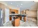 Bright kitchen with granite countertops, stainless steel appliances, and ample cabinet space at 4904 Meadows Encore Ave, Las Vegas, NV 89131