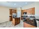 Kitchen with stainless steel appliances, granite counters, and a kitchen island at 4904 Meadows Encore Ave, Las Vegas, NV 89131