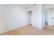 Minimalist bedroom features a closet for storage and a clean, bright atmosphere at 50 Armstrong Cir, Henderson, NV 89015