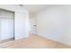 Neat bedroom features a closet for storage and light-colored floors at 50 Armstrong Cir, Henderson, NV 89015