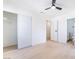 Bedroom featuring a closet, ceiling fan and access to the bathroom at 50 Armstrong Cir, Henderson, NV 89015