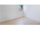 Bedroom with a window, featuring neutral walls and wood flooring at 50 Armstrong Cir, Henderson, NV 89015