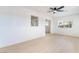 Spacious living room with open floor plan, connecting seamlessly to the kitchen area at 50 Armstrong Cir, Henderson, NV 89015