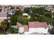 Overhead shot featuring a pool, patio, and lush backyard, complemented by neighborhood views at 5004 Ironhorse Ranch Ave, Las Vegas, NV 89131