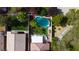 Birds-eye view of backyard with above-ground pool, patio, and surrounding greenery at 5004 Ironhorse Ranch Ave, Las Vegas, NV 89131