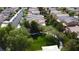 Aerial view showcasing community park with walking trails and surrounding neighborhood at 5004 Ironhorse Ranch Ave, Las Vegas, NV 89131