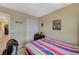 Bedroom with modern décor, including a desk and sleek, minimalist design elements at 5004 Ironhorse Ranch Ave, Las Vegas, NV 89131