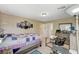 Bright bedroom with a bed, desk, dresser, and a window offers a comfortable retreat at 5004 Ironhorse Ranch Ave, Las Vegas, NV 89131
