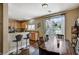 Comfortable dining area with wood floors, slider to outside, and easy access to the kitchen at 5004 Ironhorse Ranch Ave, Las Vegas, NV 89131