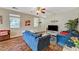 Inviting living room with hardwood floors, lots of natural light, and comfortable seating area at 5004 Ironhorse Ranch Ave, Las Vegas, NV 89131