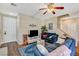 Inviting living room with hardwood floors, staircase, and comfortable seating area at 5004 Ironhorse Ranch Ave, Las Vegas, NV 89131