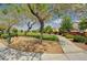 Neighborhood greenbelt includes walking path, landscaping and mature shade trees at 5004 Ironhorse Ranch Ave, Las Vegas, NV 89131