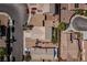 Overhead shot revealing a home with a pergola, artificial turf in a desert-style neighborhood at 5028 Crying Heart St, North Las Vegas, NV 89031