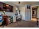 Bedroom with a desk, closet, and a view into the hallway at 5028 Crying Heart St, North Las Vegas, NV 89031