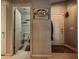 Entryway featuring a view into the bathroom and the front door at 5028 Crying Heart St, North Las Vegas, NV 89031