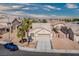 Inviting single-story home with desert landscaping, a two-car garage, and serene neighborhood views at 5028 Crying Heart St, North Las Vegas, NV 89031