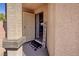 Inviting front porch with a 'Welcome' sign and stylish decor elements at 5028 Crying Heart St, North Las Vegas, NV 89031