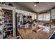 Well-lit kitchen with stainless steel appliances, granite countertops, and a walk-in pantry for optimal storage at 5028 Crying Heart St, North Las Vegas, NV 89031