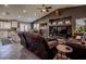 Open-concept living room flowing into the kitchen, with comfortable seating and natural light at 5028 Crying Heart St, North Las Vegas, NV 89031