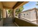 Balcony view overlooking the neighborhood with views of other units and mature trees at 5250 S Rainbow Blvd # 2101, Las Vegas, NV 89118