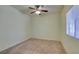 An inviting bedroom with a ceiling fan and a window with blinds at 5250 S Rainbow Blvd # 2101, Las Vegas, NV 89118