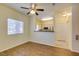 Bright living room showcasing wood floors and an open layout to the kitchen at 5250 S Rainbow Blvd # 2101, Las Vegas, NV 89118