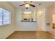 Inviting living room showcasing wood floors and an open floor plan to the kitchen at 5250 S Rainbow Blvd # 2101, Las Vegas, NV 89118
