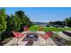 Relax in this backyard oasis with a fire pit and picturesque views at 527 Serenity Point Dr, Henderson, NV 89012