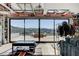 Beautiful mountain and city views from the living room balcony with seating at 527 Serenity Point Dr, Henderson, NV 89012