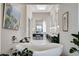 Spa-like bathroom with a soaking tub, dual vanities, and modern fixtures at 527 Serenity Point Dr, Henderson, NV 89012