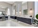 Bathroom featuring dual vanities, ample lighting, and a makeup vanity space at 527 Serenity Point Dr, Henderson, NV 89012