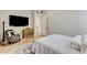 Comfortable bedroom with a television, patterned accents, and ample space, creating a relaxing retreat at 527 Serenity Point Dr, Henderson, NV 89012