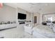 Bedroom featuring built-in electric fireplace with great seating and natural lighting at 527 Serenity Point Dr, Henderson, NV 89012