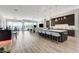 Open concept kitchen and living area with a large center island, bar seating, and modern finishes at 527 Serenity Point Dr, Henderson, NV 89012