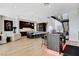A modern open kitchen with a large island, bar, and stainless steel appliances at 527 Serenity Point Dr, Henderson, NV 89012