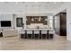 Bright open kitchen with a large island, modern pendant lights, and stainless steel appliances at 527 Serenity Point Dr, Henderson, NV 89012