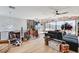 Unique living room with access to a balcony with mountain views at 527 Serenity Point Dr, Henderson, NV 89012