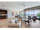 Open living space with dining area, comfortable seating, and views of the outdoor patio at 527 Serenity Point Dr, Henderson, NV 89012