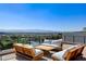 Inviting outdoor seating area with panoramic city views, ideal for relaxation at 527 Serenity Point Dr, Henderson, NV 89012
