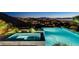 Relax and rejuvenate in this stunning pool and spa area with city views, perfect for unwinding after a long day at 527 Serenity Point Dr, Henderson, NV 89012