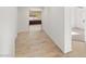Entryway showcasing wood-look tile floors and an open-concept layout leading to other rooms at 5338 Lignum Ave, Pahrump, NV 89061