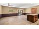 Spacious living room featuring wood-look floors and offering a view of the backyard at 5338 Lignum Ave, Pahrump, NV 89061