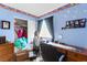 Bedroom featuring blue walls, carpeted floors, and a small closet at 5539 Foxtail Ridge St, North Las Vegas, NV 89031