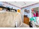 Bedroom featuring blue walls, carpeted floors, and small storage at 5539 Foxtail Ridge St, North Las Vegas, NV 89031
