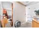 Upstairs hallway, with view into bedroom and staircase at 5539 Foxtail Ridge St, North Las Vegas, NV 89031