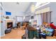Bright living room features a cozy fireplace and an open layout at 5539 Foxtail Ridge St, North Las Vegas, NV 89031