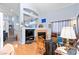 Bright living room features a cozy fireplace and an open layout at 5539 Foxtail Ridge St, North Las Vegas, NV 89031